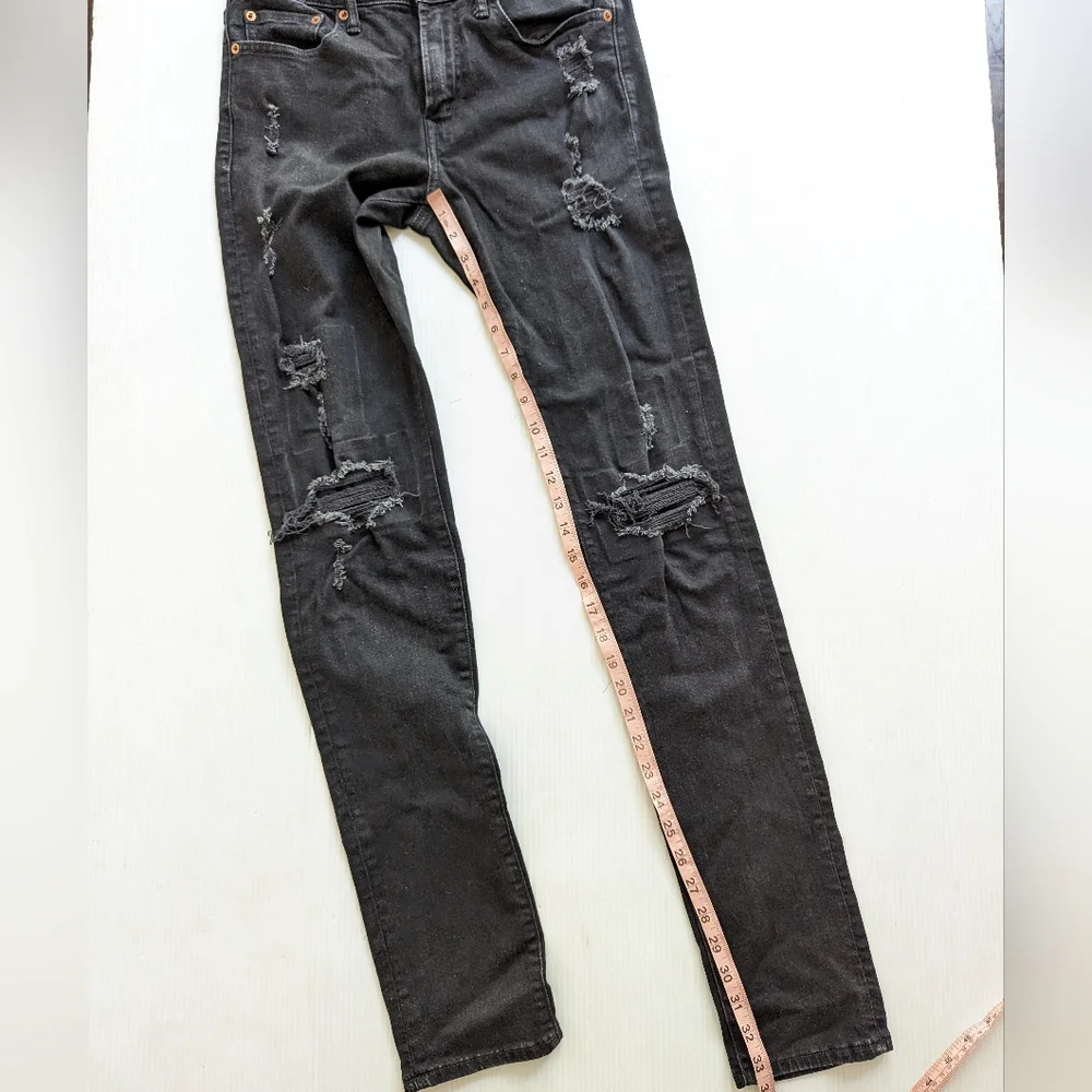 AMERICAN EAGLE Airflex ripped distressed black denim skinny jeans